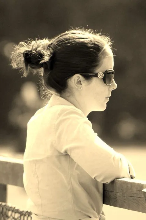 Daisy Smith looking over a fence